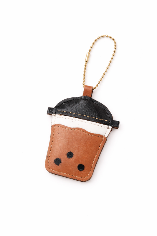 Small leather pouch with black accents on a white background