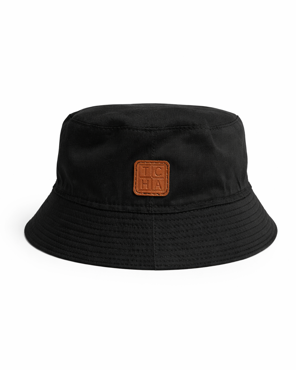 Black bucket hat with a brown logo patch on a white background