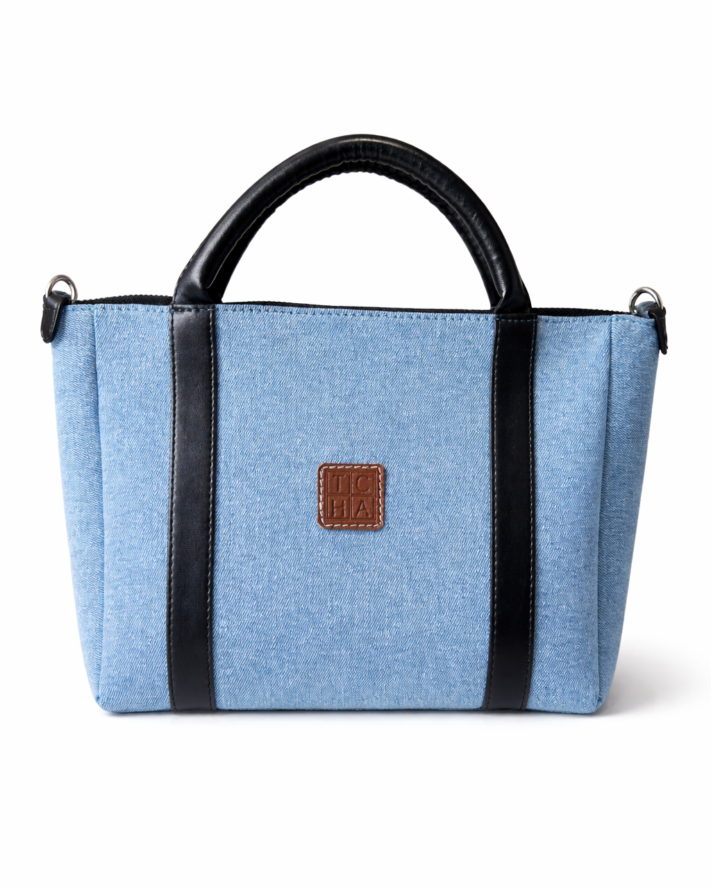 Blue handbag with black handles and trim on a white background