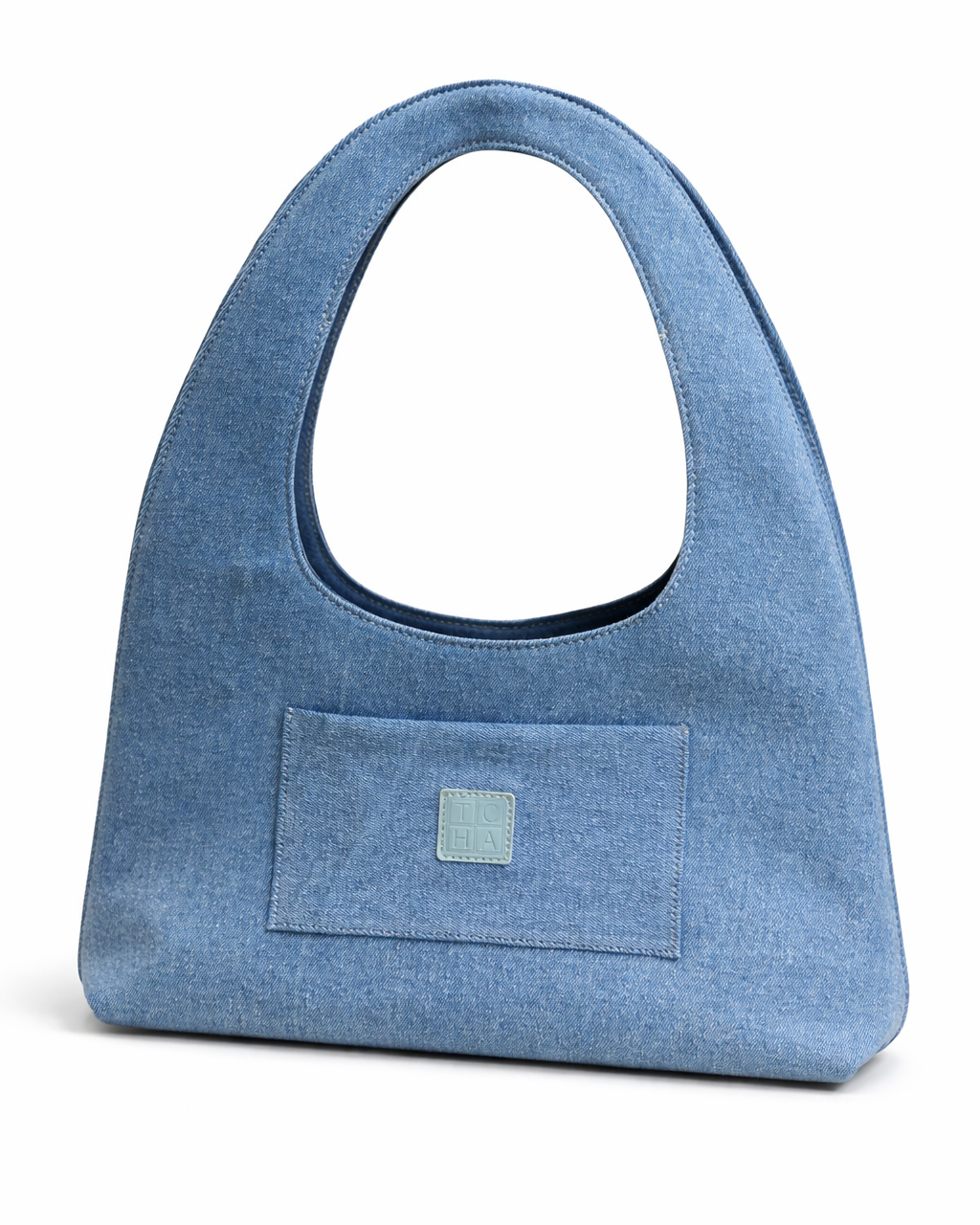 Blue handbag with a front pocket on a white background